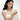 Asian female model wearing sustainable gold jewelry: necklace, bangles, white outfit.
